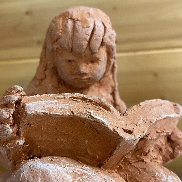 Local artist clay girl reading. - Picture 2 of 7